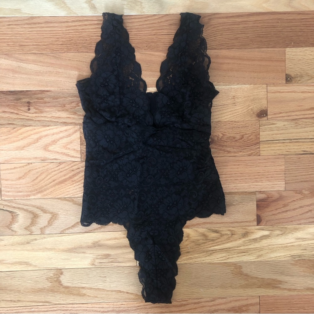 We Are HAH black lace reversible bodysuit